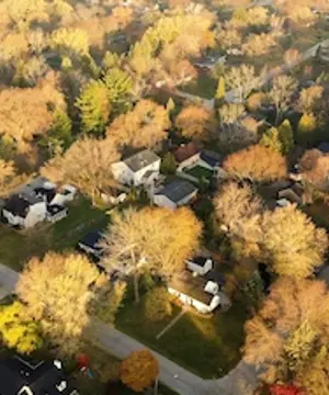 Aerial drone view of American suburban neighborhood.